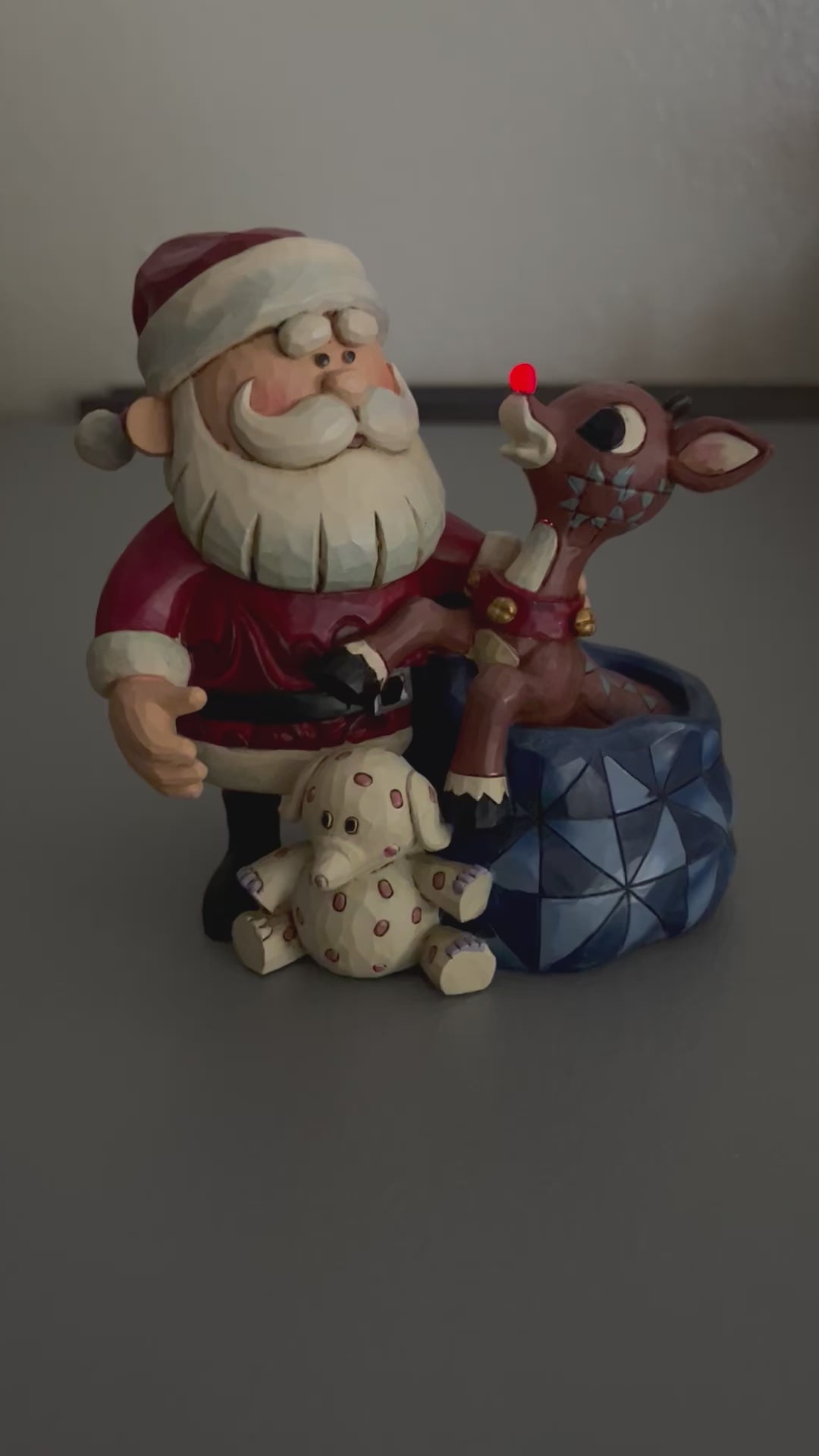 Jim Shore Rudolph Traditions - Santa & Rudolph with Blinking Nose Spotted Elephant Figurine